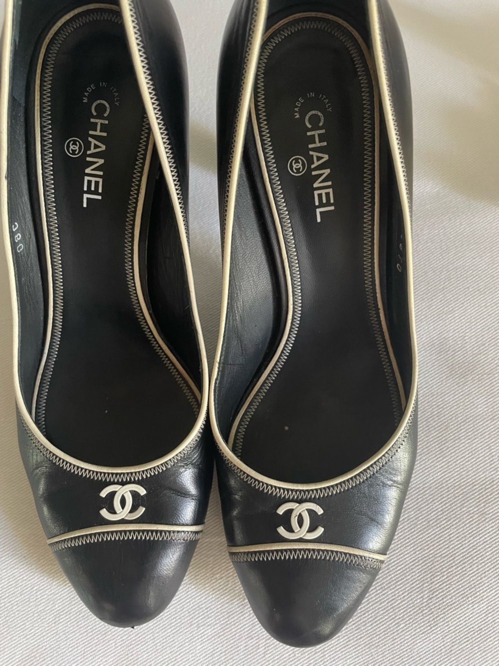 CHANEL Black/Navy?? Leather pumps with Cream Trim and CC Logos